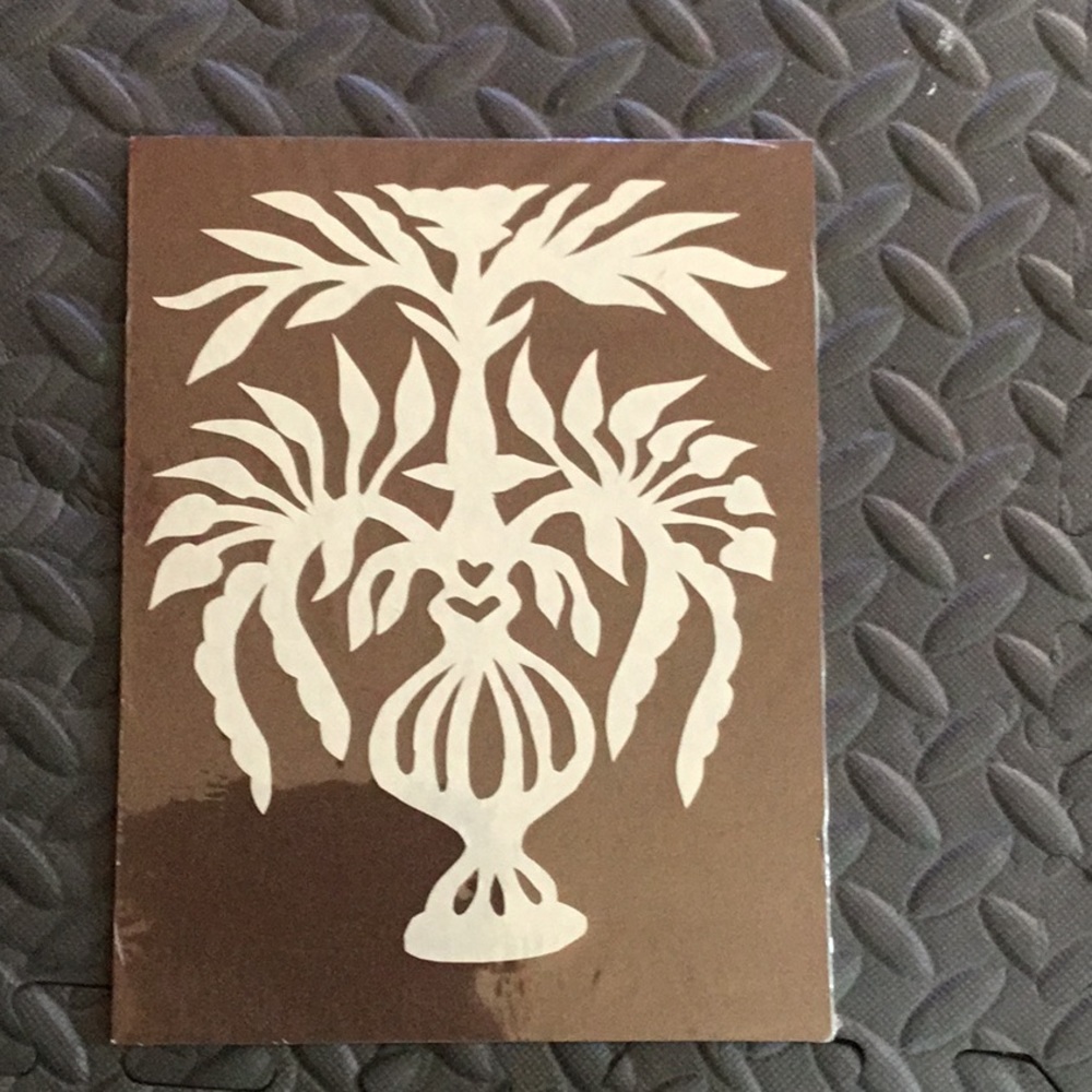 Traditional scherenschnitte art brown background